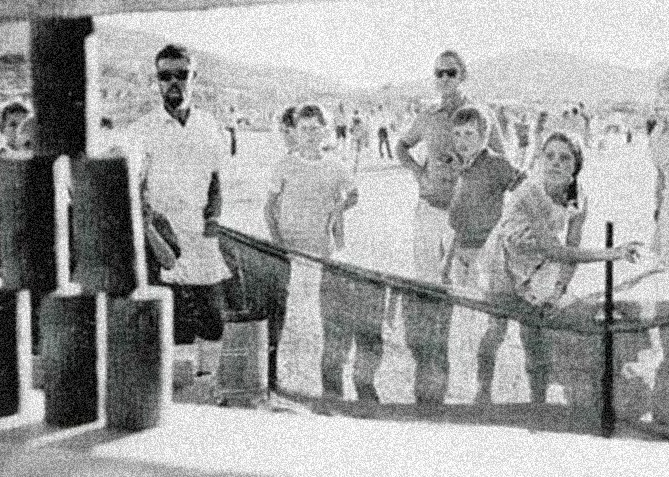 Black and white image of children playing Knock Em at the Nameless Festival circa 1960s - 1970s