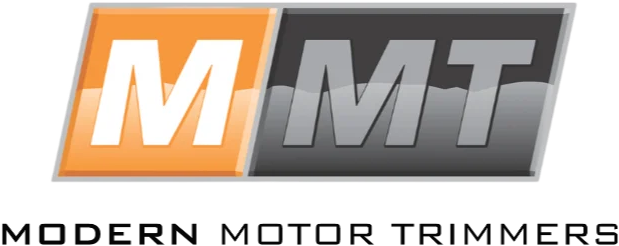 Modern Motor Trimmers logo, showing the letters 'MMT' in white on a two-tone parallelogram badge (orange left half, grey right half), with 'MODERN MOTOR TRIMMERS' in bold grey text below.