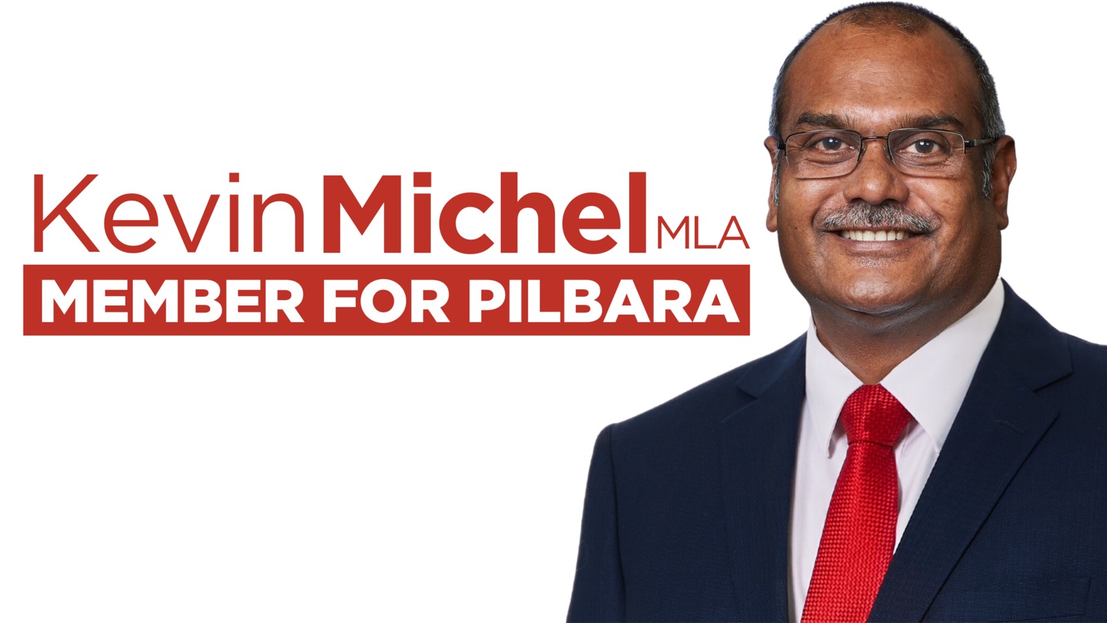Campaign portrait of Kevin Michel MLA smiling in a navy suit and red tie beside the text "Kevin Michel MLA