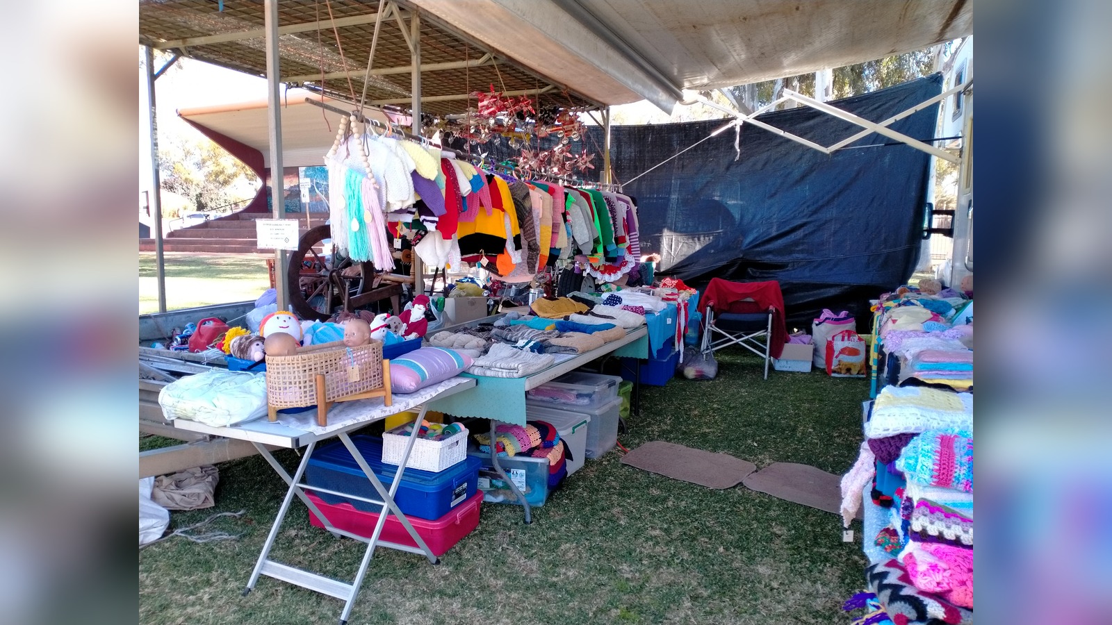 Market stall of handmade knitted jumpers