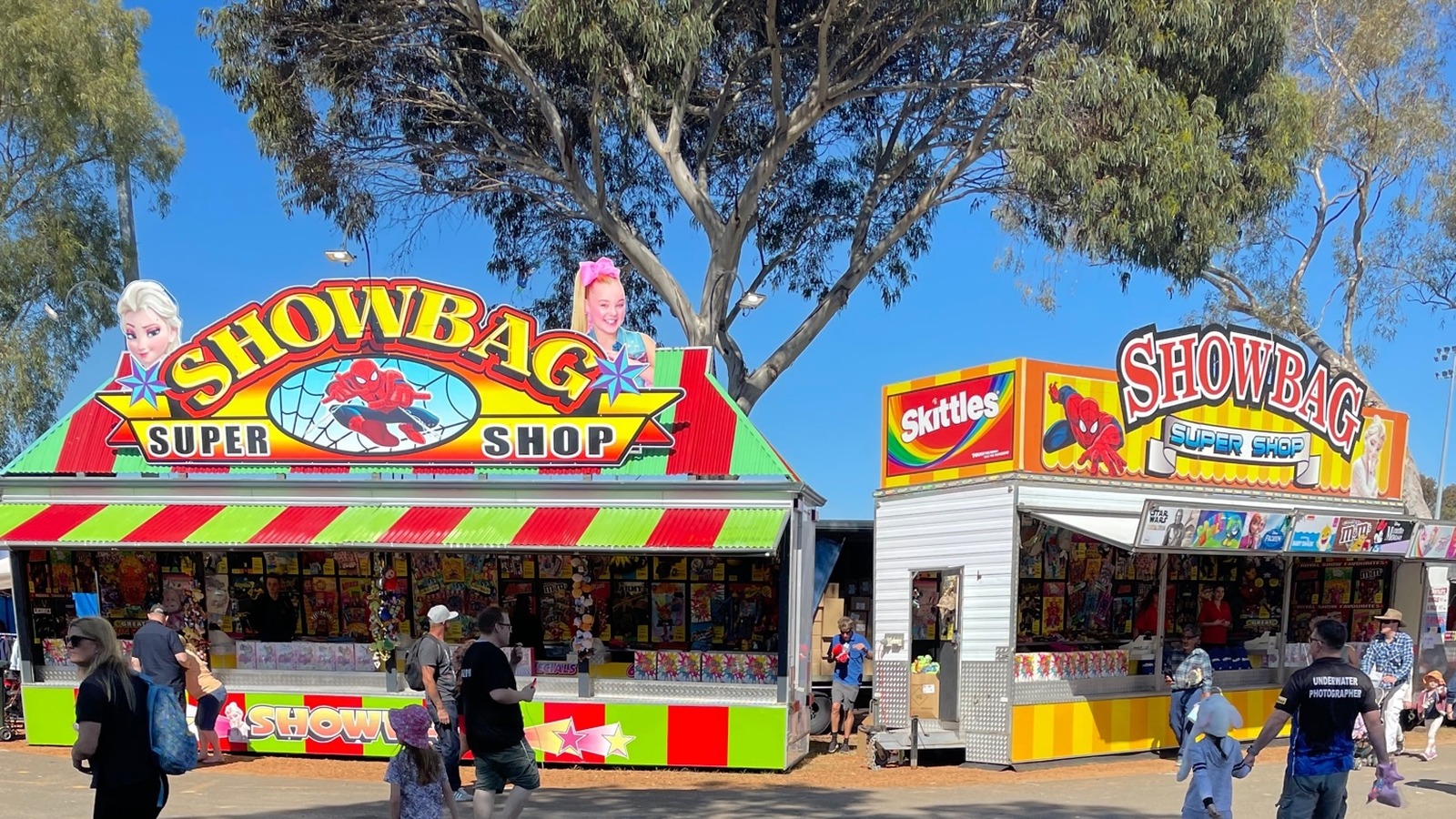 Showbag Super Shop trailers with colourful Spider-Man and Elsa signage