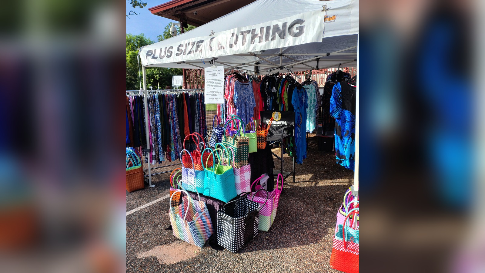 Plus Size Clothing stall with a "Plus Size Clothing" banner