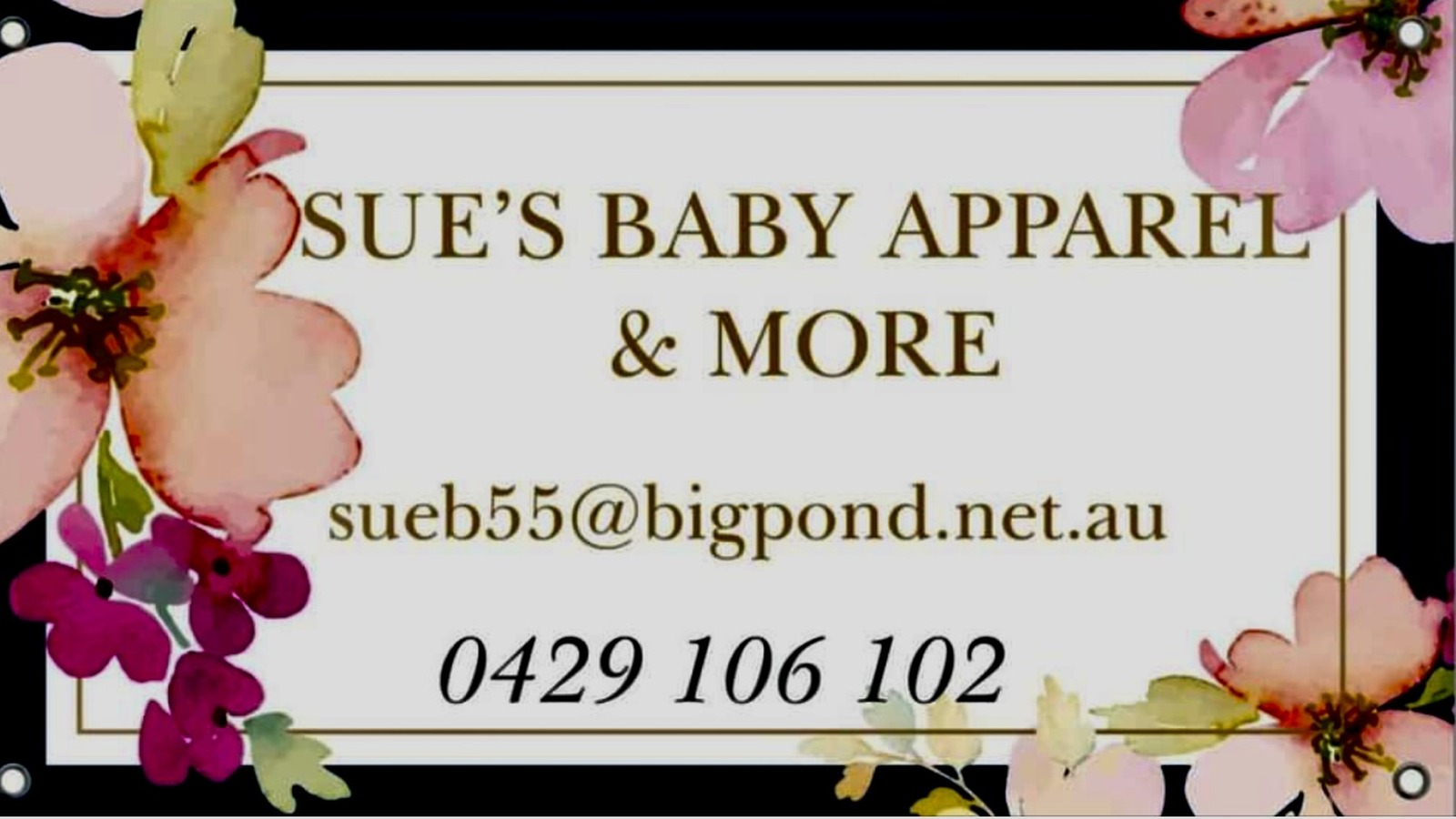 Floral-bordered sign reading "Sue's Baby Apparel & More" with contact email and phone number.