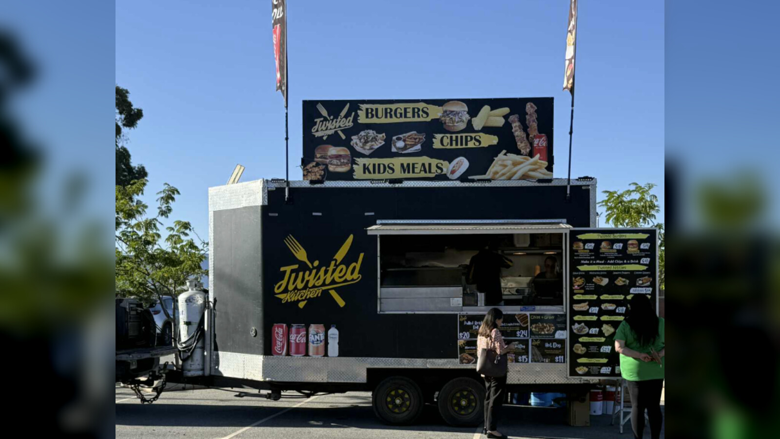 The Twisted Kitchen food trailer with fork-and-knife logo
